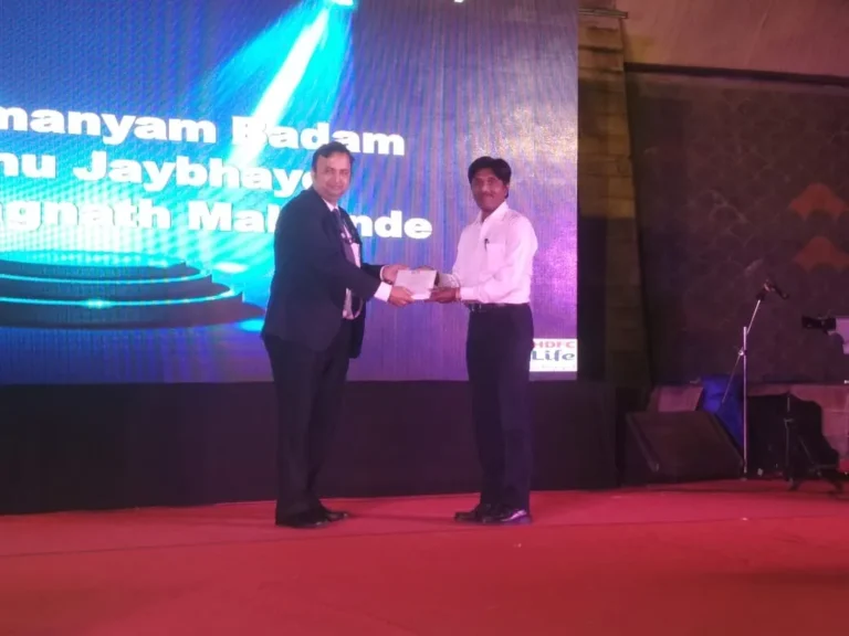 HDFC Life Insurance Mr Rahul Gadre, Circle Head, HDFC life   has given awards to Sanjay Malgonde for his achievement