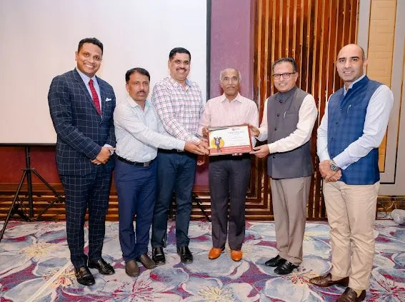 Shri Nilesh Shah MD of Kotak Mutual Fund facilitated by given Awarded to Team Suvidha